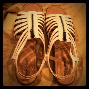 Zippered strappy sandal.